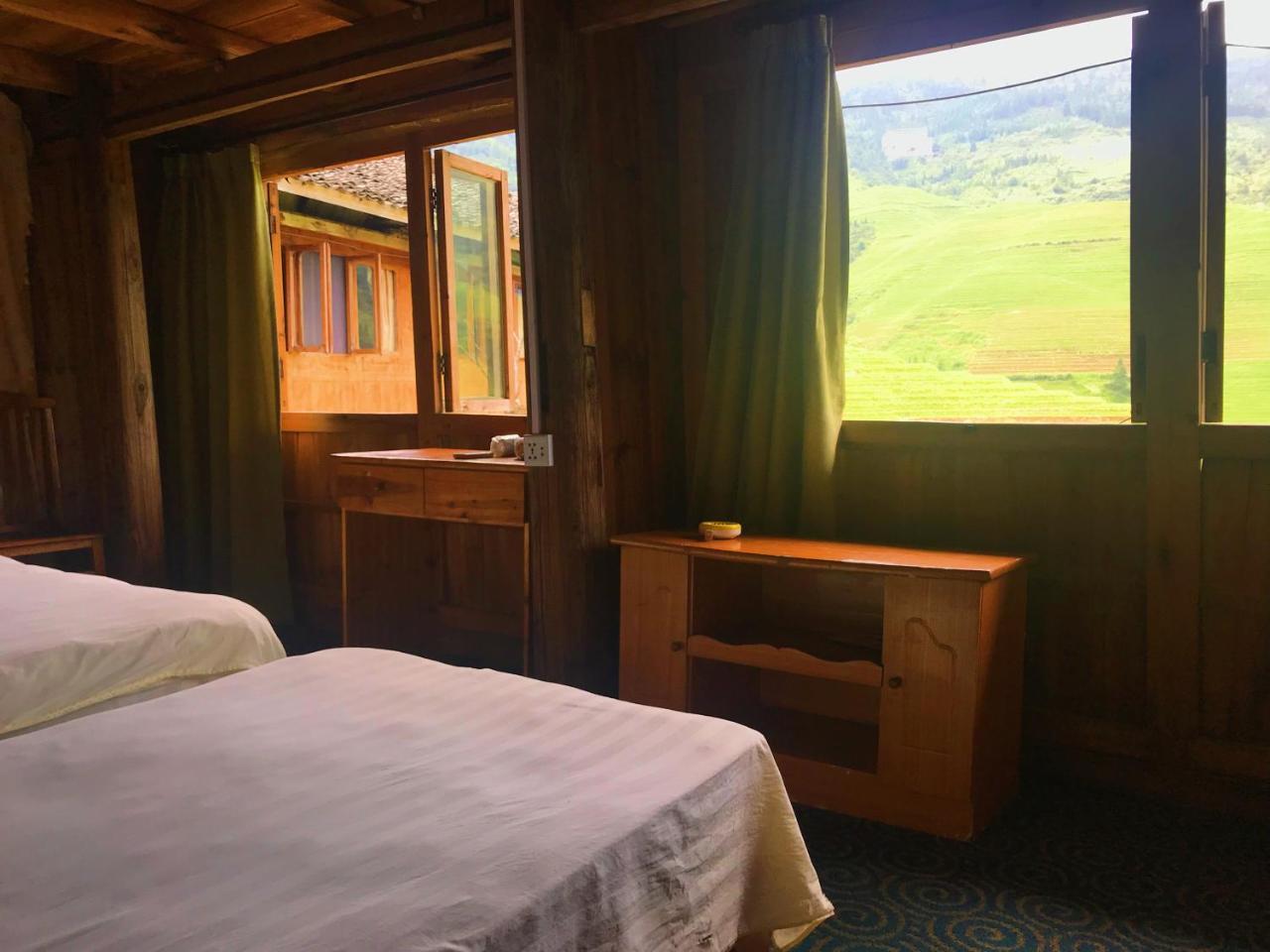 Dragon'S Den Hostel หลงเซิง ภายนอก รูปภาพ