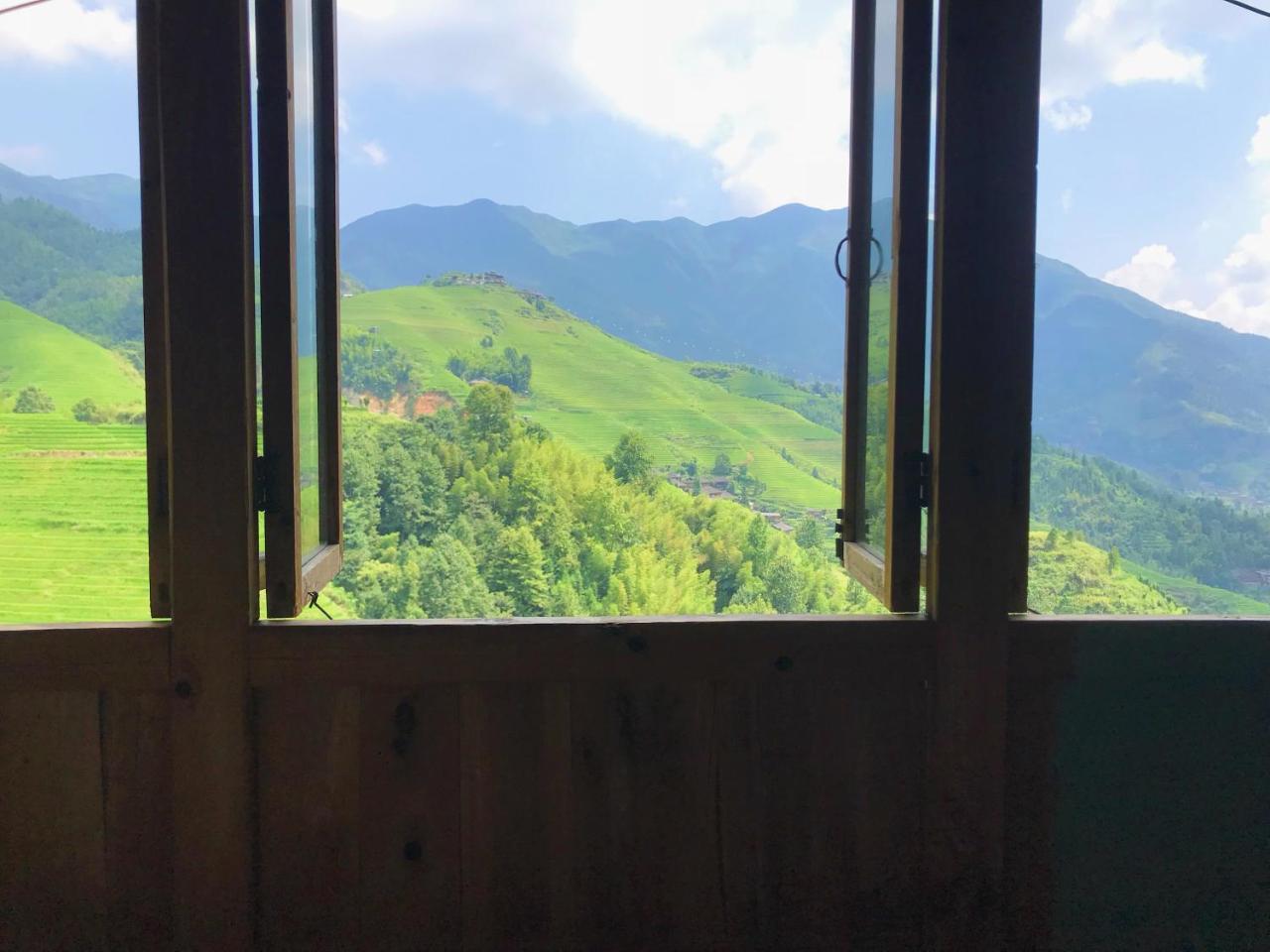 Dragon'S Den Hostel หลงเซิง ภายนอก รูปภาพ