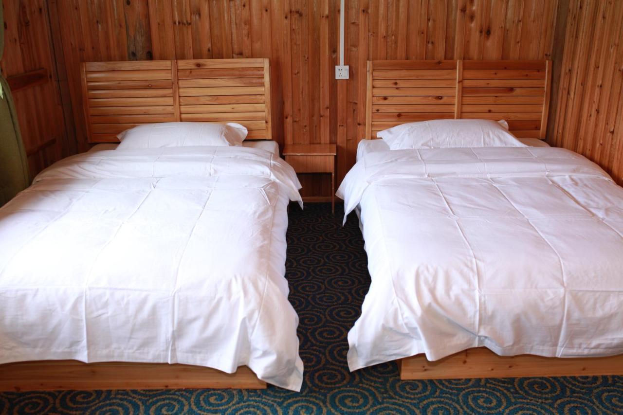 Dragon'S Den Hostel หลงเซิง ภายนอก รูปภาพ