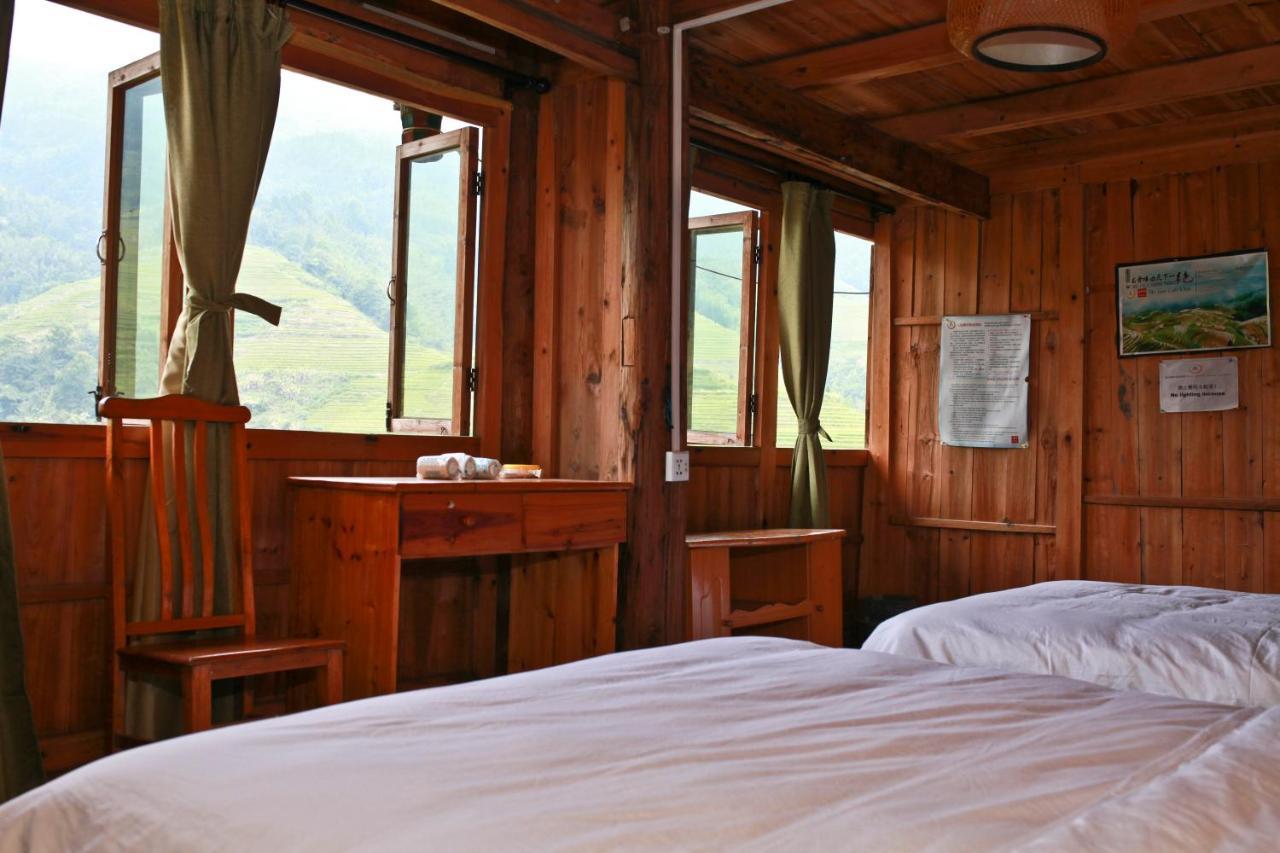 Dragon'S Den Hostel หลงเซิง ภายนอก รูปภาพ
