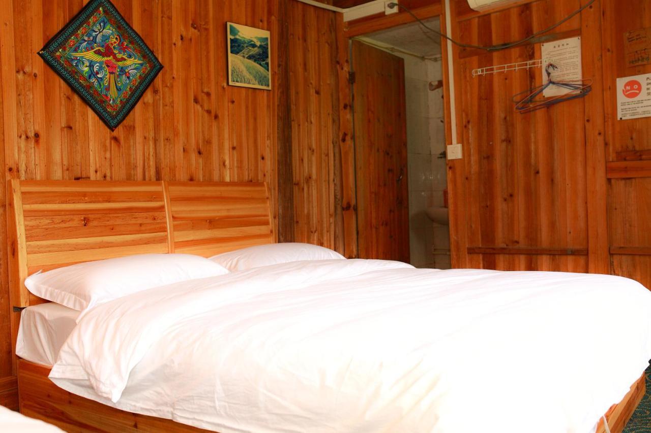 Dragon'S Den Hostel หลงเซิง ภายนอก รูปภาพ