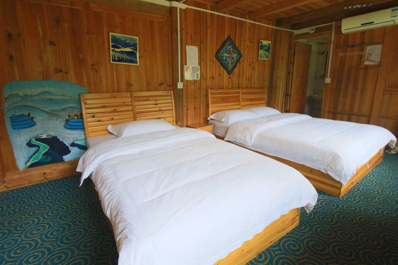 Dragon'S Den Hostel หลงเซิง ภายนอก รูปภาพ