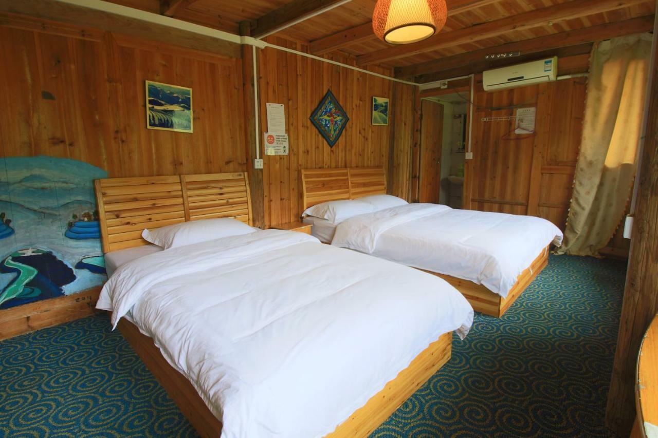 Dragon'S Den Hostel หลงเซิง ภายนอก รูปภาพ