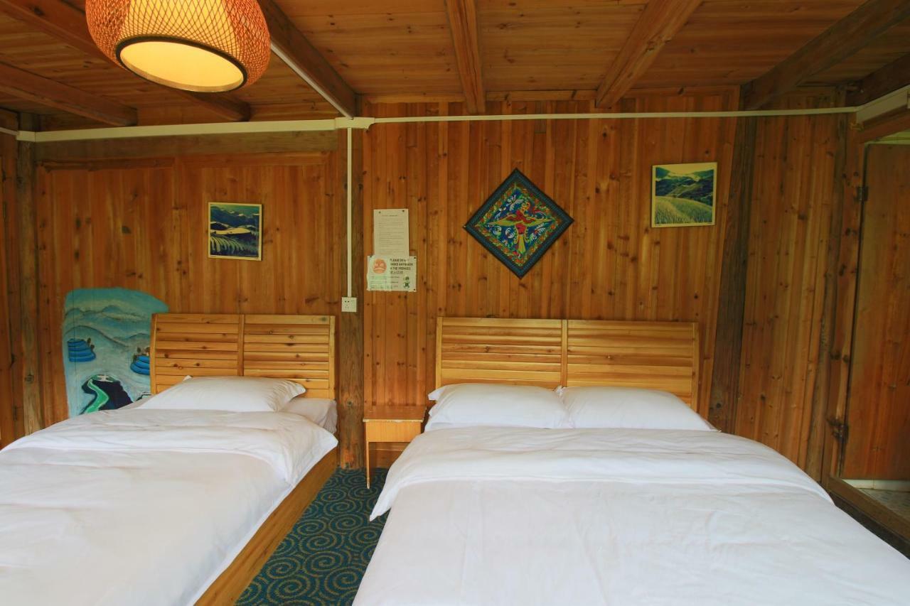 Dragon'S Den Hostel หลงเซิง ภายนอก รูปภาพ